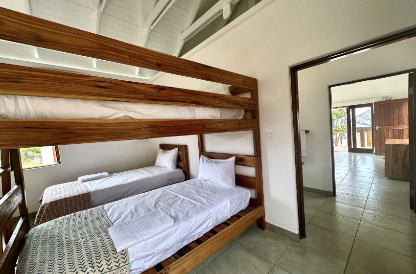 Bunk bedroom at Makana 7 in Ponta Mamoli