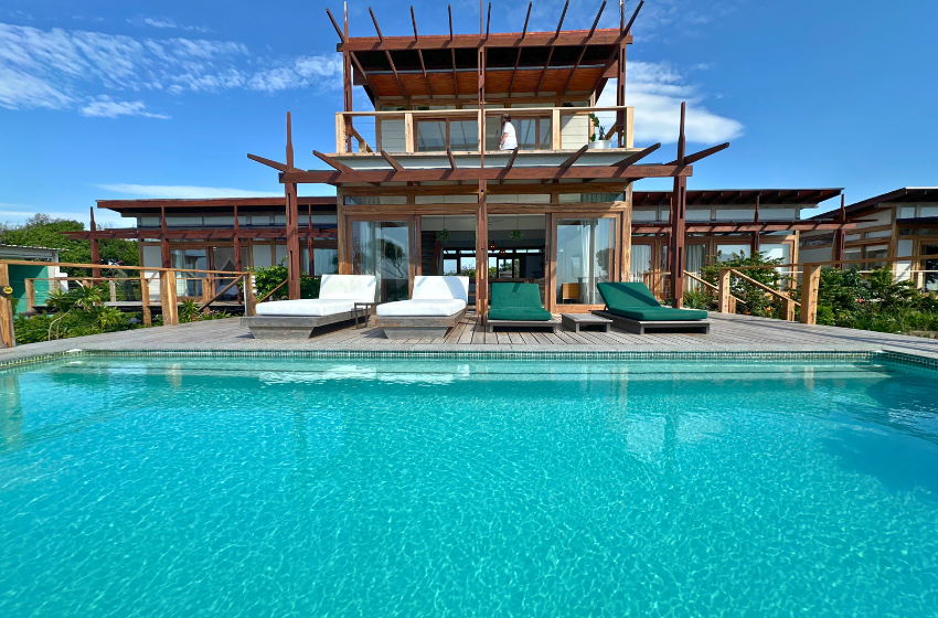 Pool with house in the background at Aloha 29 in Ponta Mamoli