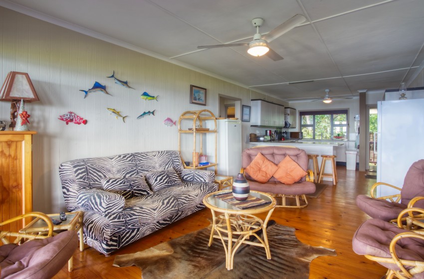 Lounge with kitchen at Campismo Ninho 23 in Ponta Malongane