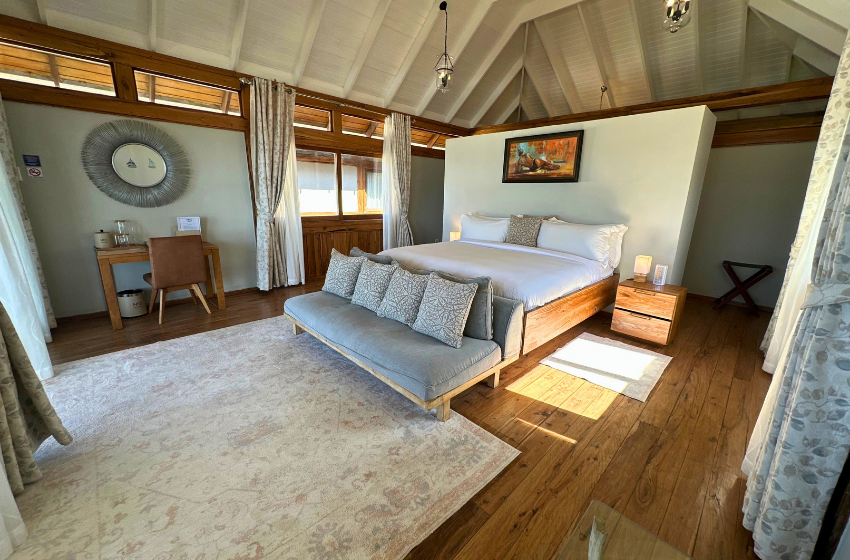 bedroom 2 with side table at Aloha 5 in Ponta Mamoli